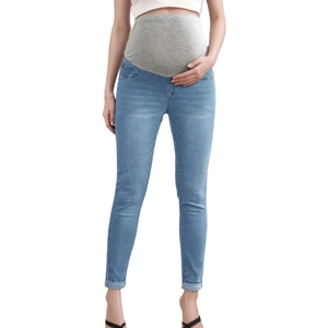 Detail view of high-waisted maternity jeans with grey elastic abdominal support band