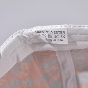 Detail of baseball cap interior showing 100% polyester fabric and quality stitching