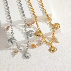 Vintage shell and star stainless steel chain necklace in gold and silver finishes
