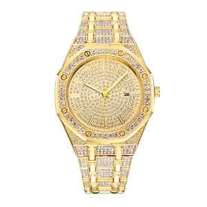 Luxurious gold-tone octagonal men's watch fully iced out with crystals and date display