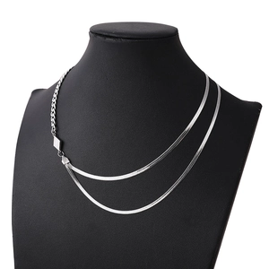 Double-layered silver titanium steel necklace featuring a snake chain and cuban link design