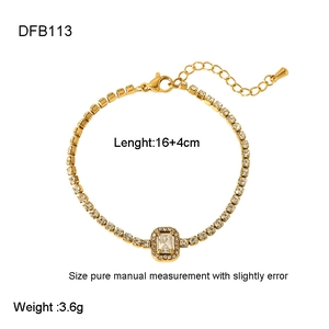 Detail of 18k gold plated tennis bracelet with emerald cut zircon and lobster clasp