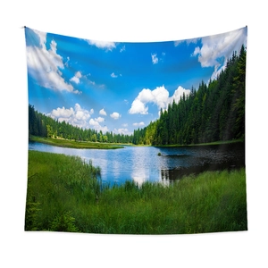 Bohemian wall tapestry featuring a deep blue lake and lush forest natural landscape scenery