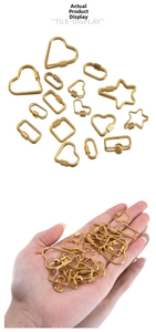 Detailed close-up of golden stainless steel heart and star shaped jewelry connectors
