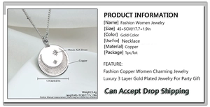 Macro detail of gold plated coin pendant with moon star motif and AAA zircon inlays