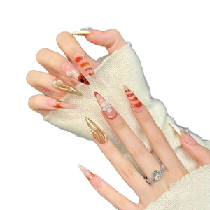 Handmade stiletto press-on nails with 3D white flowers and gold metallic chrome texture