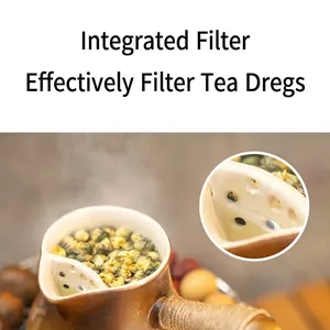 Ceramic tea pot with built-in filter and hemp rope handle for traditional tea brewing