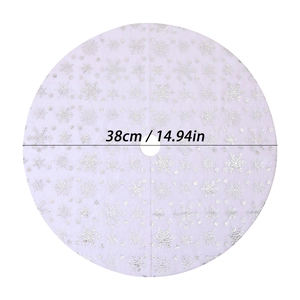 Detail view of 38cm white plush Christmas tree skirt featuring silver sequin snowflakes