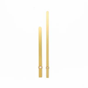 Minimalist matte gold quartz clock hands set with brushed metal texture for repairs