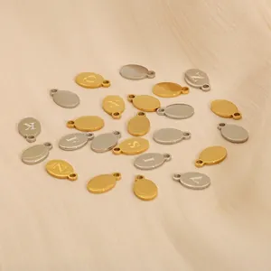 Polished gold and silver oval letter charms for DIY necklace and bracelet jewelry