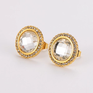 Detailed close-up of gold round stud earrings with center glass stone and crystal halo