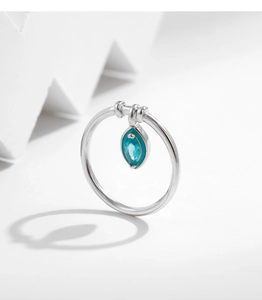 Detailed view of an s925 silver ring featuring a marquise-cut mint green crystal pendant