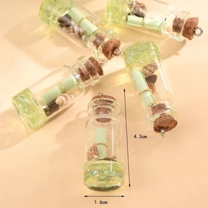 Mini glass drift bottle charm with green scroll and shells, size 4.3cm by 1.6cm