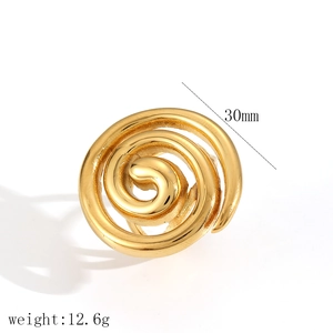 Macro detail of gold spiral ring with 30mm diameter and 12.6g weight on white background