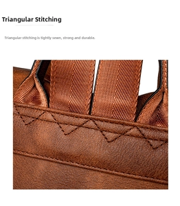 Close-up of brown pebbled leather bag featuring durable triangular reinforced stitching details
