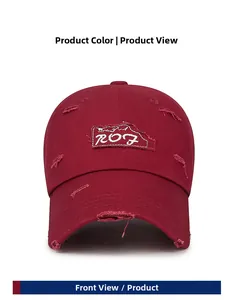 Front view of burgundy baseball cap with distressed details and letter patch embroidery