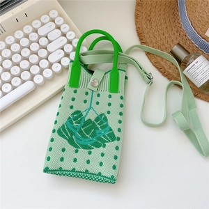 Detailed knit phone bag featuring green polka dots and a cute zongzi leaf design