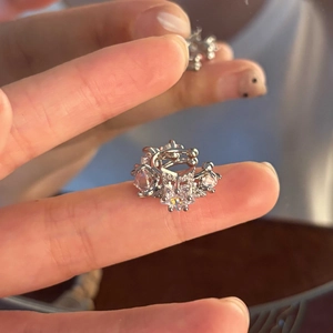 Elegant silver star ear cuff for women featuring sparkling zircon stones and a star design