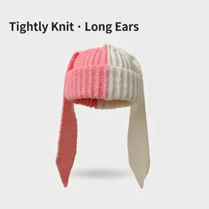 Pink and white patchwork knitted rabbit ear beanie for women with long decorative ears