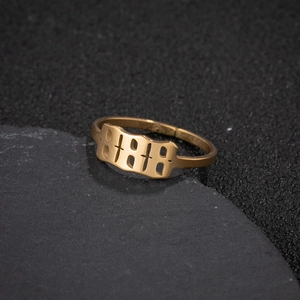 Detailed view of gold stainless steel 888 angel number ring in gothic hollow style