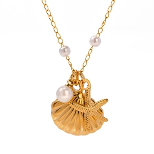 French ocean themed gold starfish and seashell necklace with elegant pearl accents
