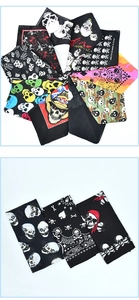 Macro view of 100% cotton skull pattern bandanas showing diverse prints and high-quality fabric