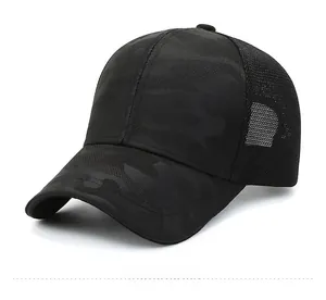 Close-up of black camouflage baseball cap with breathable mesh back and curved brim