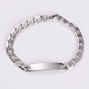 Detailed close-up of a silver Cuban link bracelet featuring a blank engravable metal plate