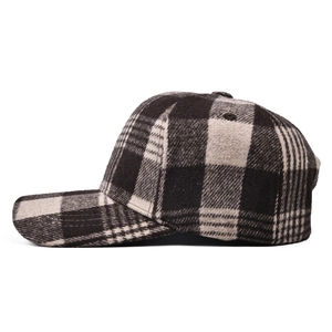Close-up of wool plaid baseball cap featuring thick fabric and precise stitching details