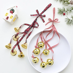 Christmas iron bells with plaid ribbons for festive holiday tree and door decorations