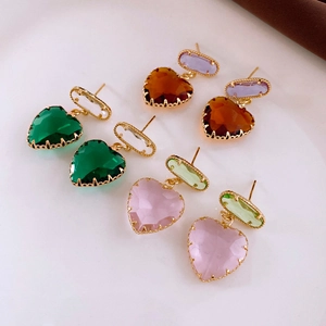 Elegant gold earrings with multi-colored heart-shaped crystals and faceted stones
