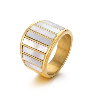 Chic gold-plated stainless steel wide ring featuring elegant white seashell inlay stripes