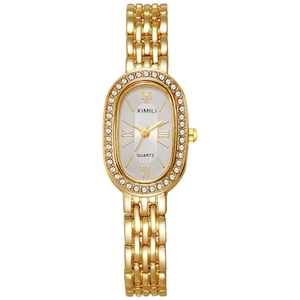 Luxury gold women's quartz watch with oval diamond-set bezel and five-link metal strap