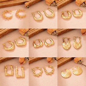 Boucles d'Oreilles Créoles Torsadées en Acier Inoxydable Vintage pour Femmes Plaqué Or Géométrique en Forme de U Bijoux de Mode