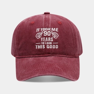 Vintage burgundy washed cotton baseball cap with embroidered 90th birthday slogan