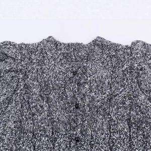 Veste en tricot pour femme avec manches bouffantes et tissu chiné à boutons noirs