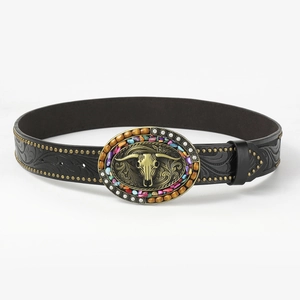 Detail of bohemian black leather belt with golden bull skull buckle and colorful beads