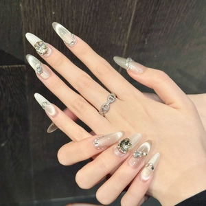 Faux ongles œil de chat de luxe avec strass et perles en forme d'amande longue