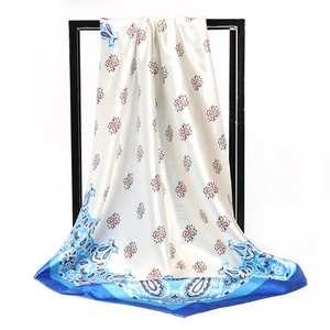 Elegant white satin square scarf with blue paisley print and border detail