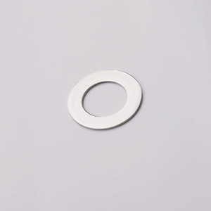 Close-up of a silver mirror-polished stainless steel hollow circular pendant on white background