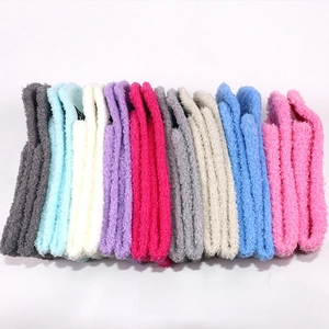 Detailed texture of thick coral fleece winter socks in multiple vibrant color options