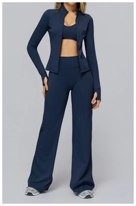 Detailed view of high-waist wide-leg pants and thumbhole jacket in navy yoga set