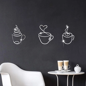 Silver mirror acrylic coffee cup wall decals shown in a cozy modern cafe setting