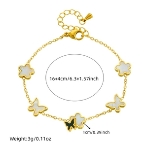 Close-up of gold chain bracelet with flower and butterfly charms and product dimensions