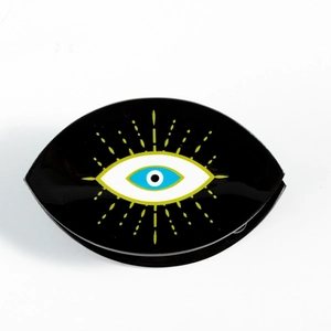 Glossy black Evil Eye hair claw clip with vibrant blue and yellow pattern for bun hairstyles