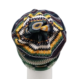 Detail of bohemian zigzag knit pattern on thick winter beanie and neck warmer