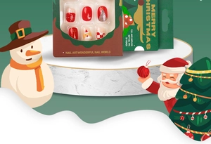 Detailed Christmas nail kit featuring red and beige festive patterns on marble pedestal