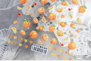 Detail of TS-631 nail stickers featuring watercolor orange slices and heart patterns