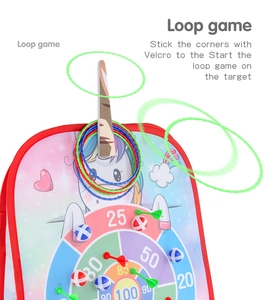 Detail of unicorn 3-in-1 target board with score zones, bean bags, and colorful rings