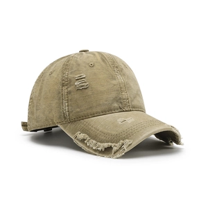Vintage washed khaki cotton baseball cap with distressed details on white background